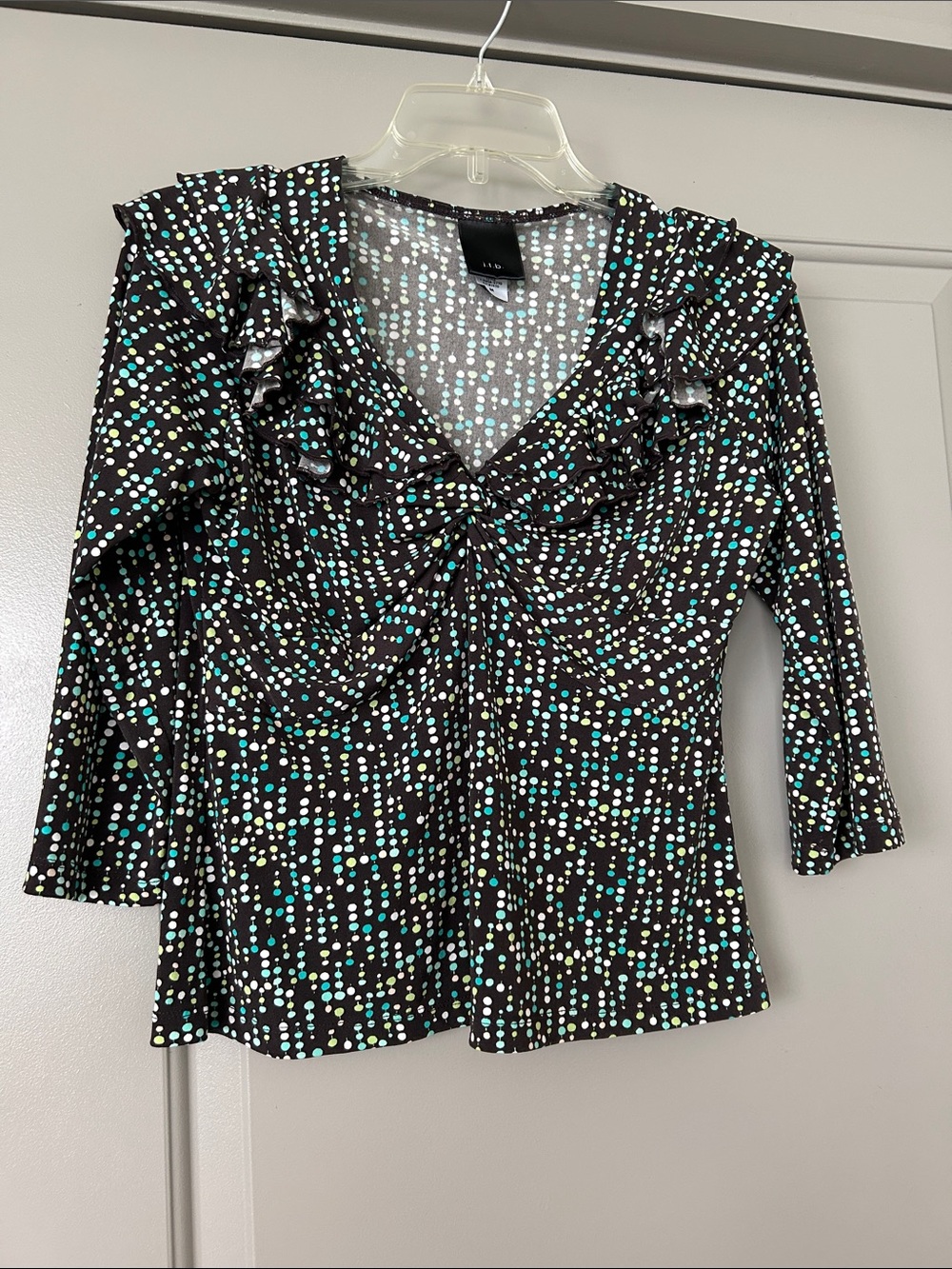Ruffled V-Neck Polka Dot Blouse in Black with Mint and White Dots